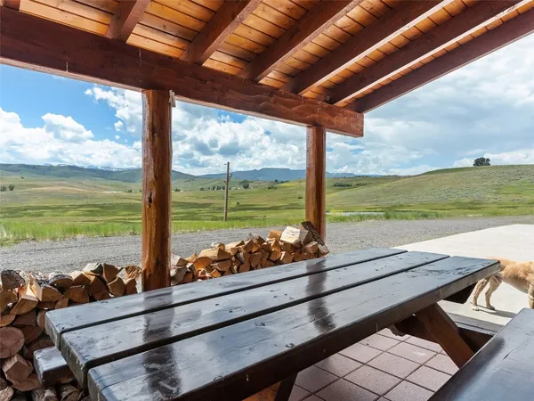 a view of a outdoor seating area with furniture