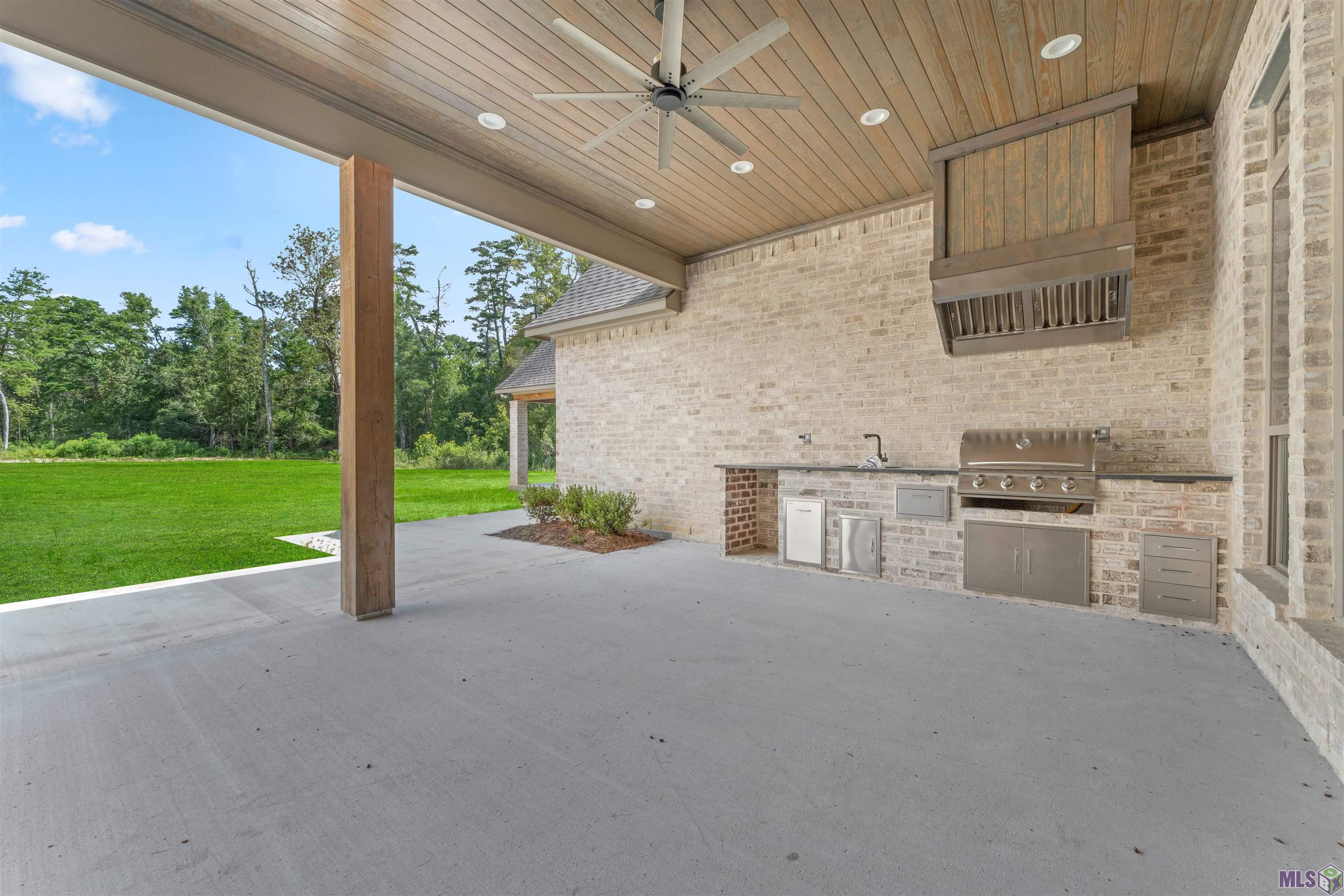 9189 Hillon Hood Road Denham Springs, LA 70726 - Photo 37 of 41 Outdoor Living with Outdoor Kitchen !