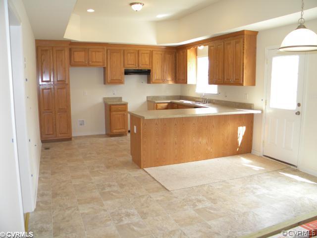 5715 Courthouse Road Prince George, VA 23875 - Photo 3 of 12 Kitchen - Custom oak, raised paneled cabinets with