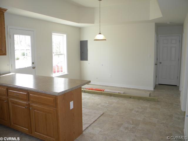 5715 Courthouse Road Prince George, VA 23875 - Photo 4 of 12 Kitchen - Eat-in area. Back door leads to deck.