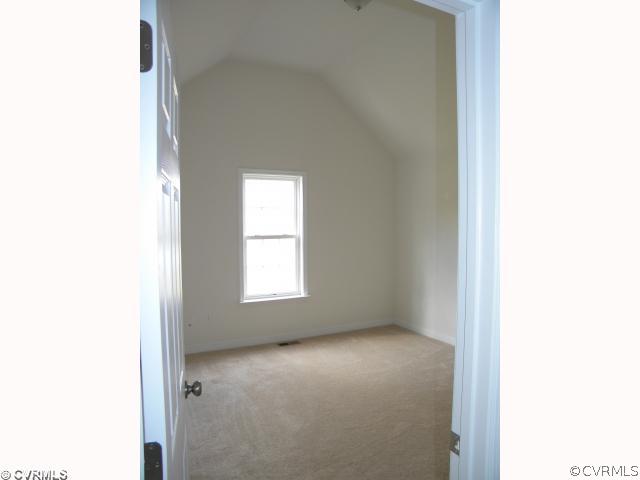 5715 Courthouse Road Prince George, VA 23875 - Photo 10 of 12 Bedroom - Second bedroom with a cathedral ceiling.