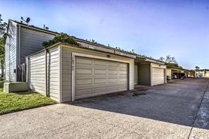 10763 Sandpiper Drive Houston, TX 77096 - Photo 22 of 26 a view of a house with a garage