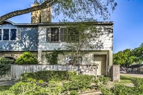 10763 Sandpiper Drive Houston, TX 77096 - Photo 25 of 26 a front view of a house with a yard
