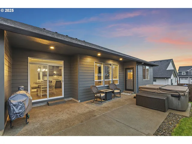 a backyard of house with seating space