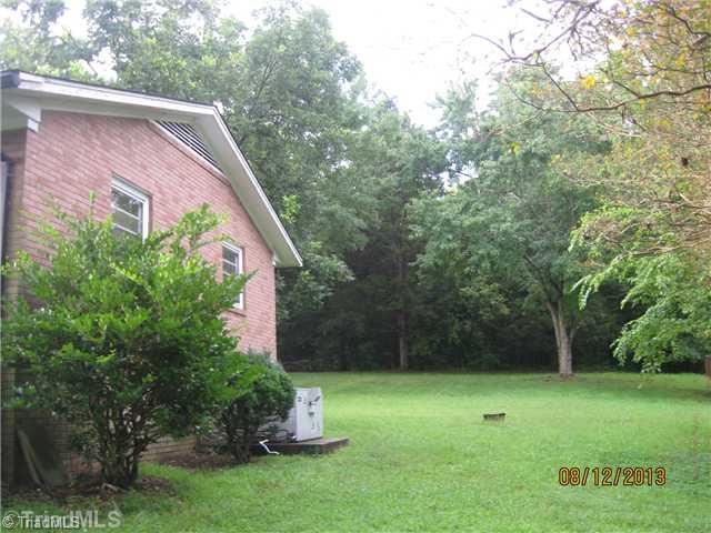 205 Ivey Road Graham, NC 27253 - Photo 14 of 16 Exterior Front. Right side of home