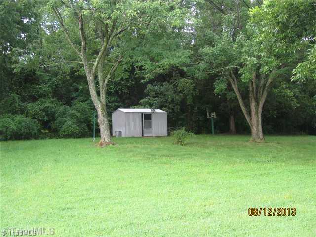 205 Ivey Road Graham, NC 27253 - Photo 3 of 16 Exterior Front. Back Yard