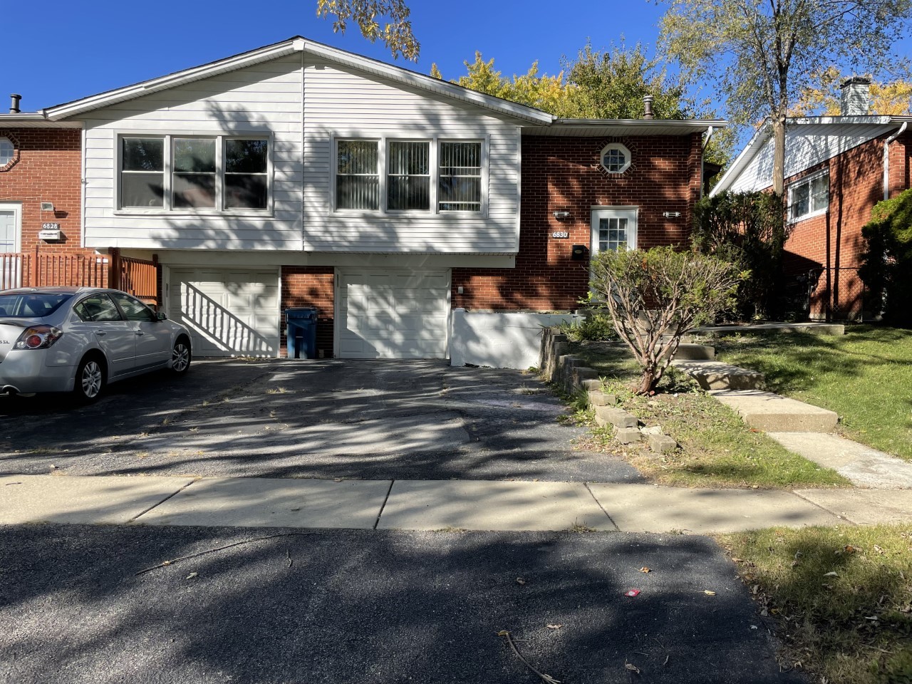 a front view of a house with a porch