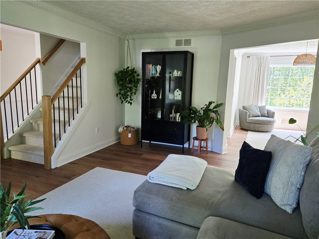 1081 Bright Stream Way Webster, NY 14580 - Photo 6 of 50 The room immediately to your right is spacious and bright.