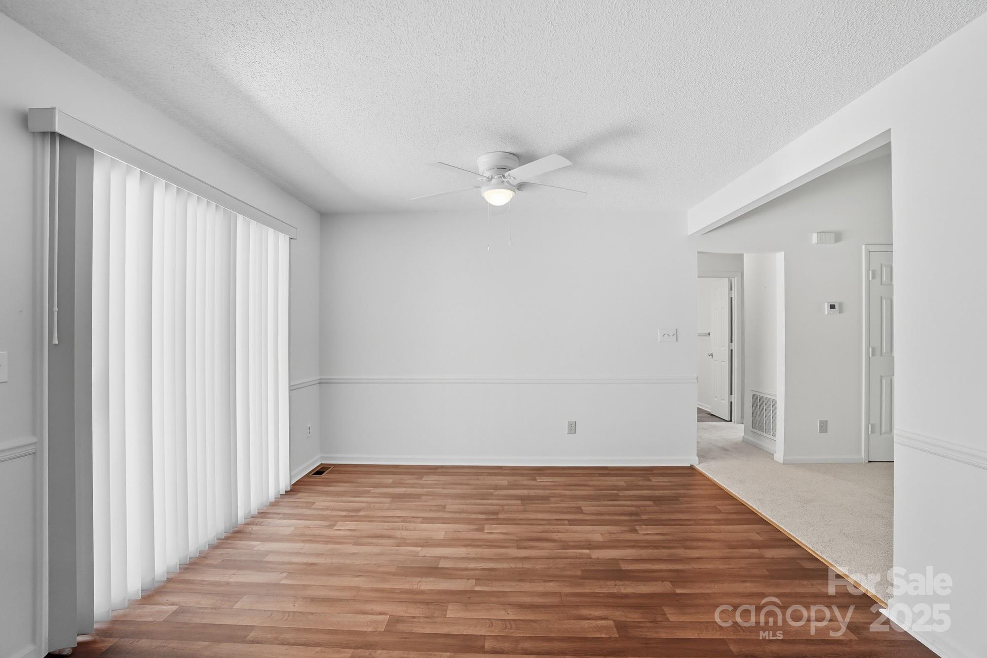 803 Victorian Lane Monroe, NC 28112 - Photo 11 of 46 wooden floor in an empty room