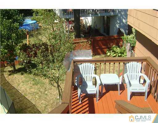 9 Birch Road Edison, NJ 08817 - Photo 3 of 10 a view of a chairs and table in the balcony