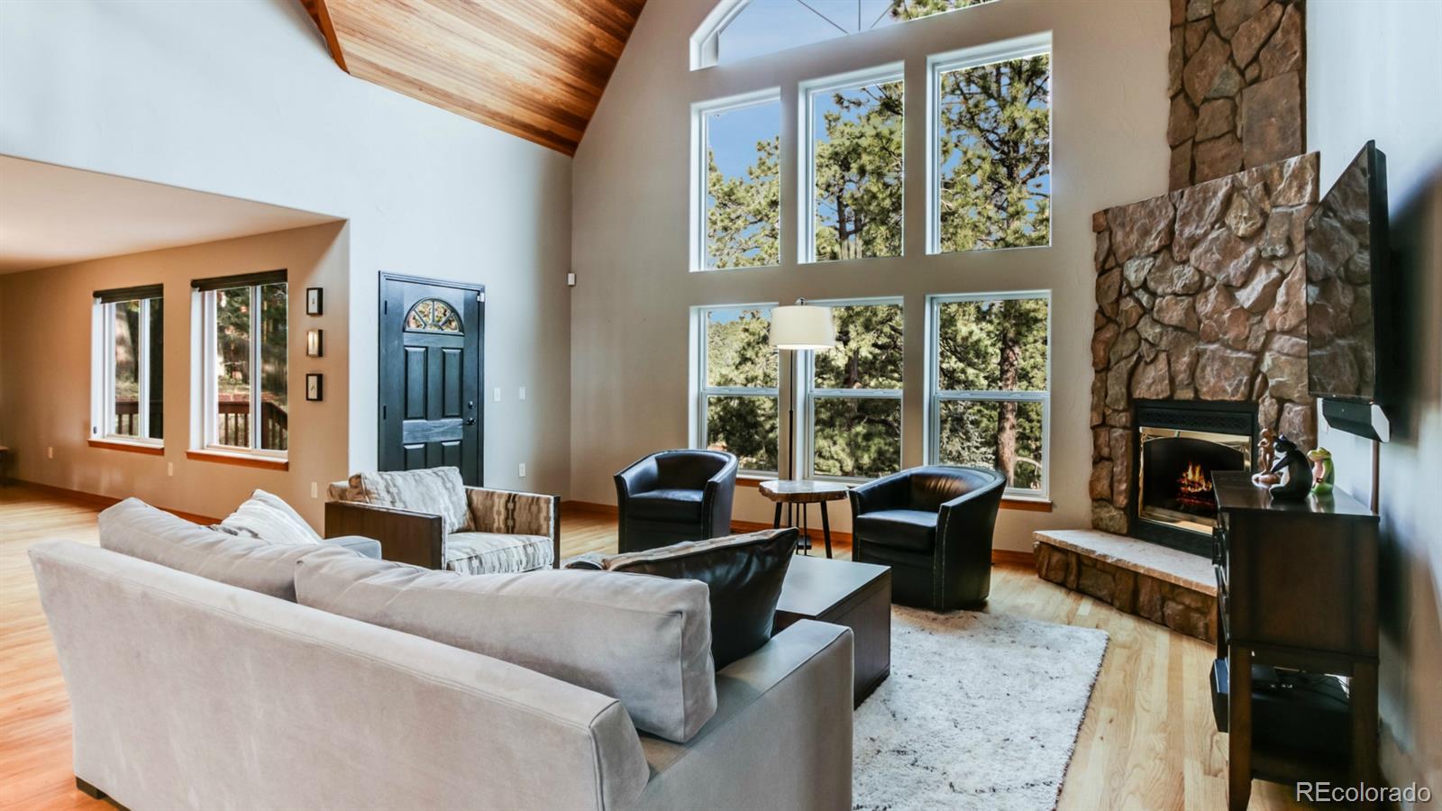 50 South Pine Road Golden, CO 80401 - Photo 12 of 35 a living room with fireplace furniture and a large window