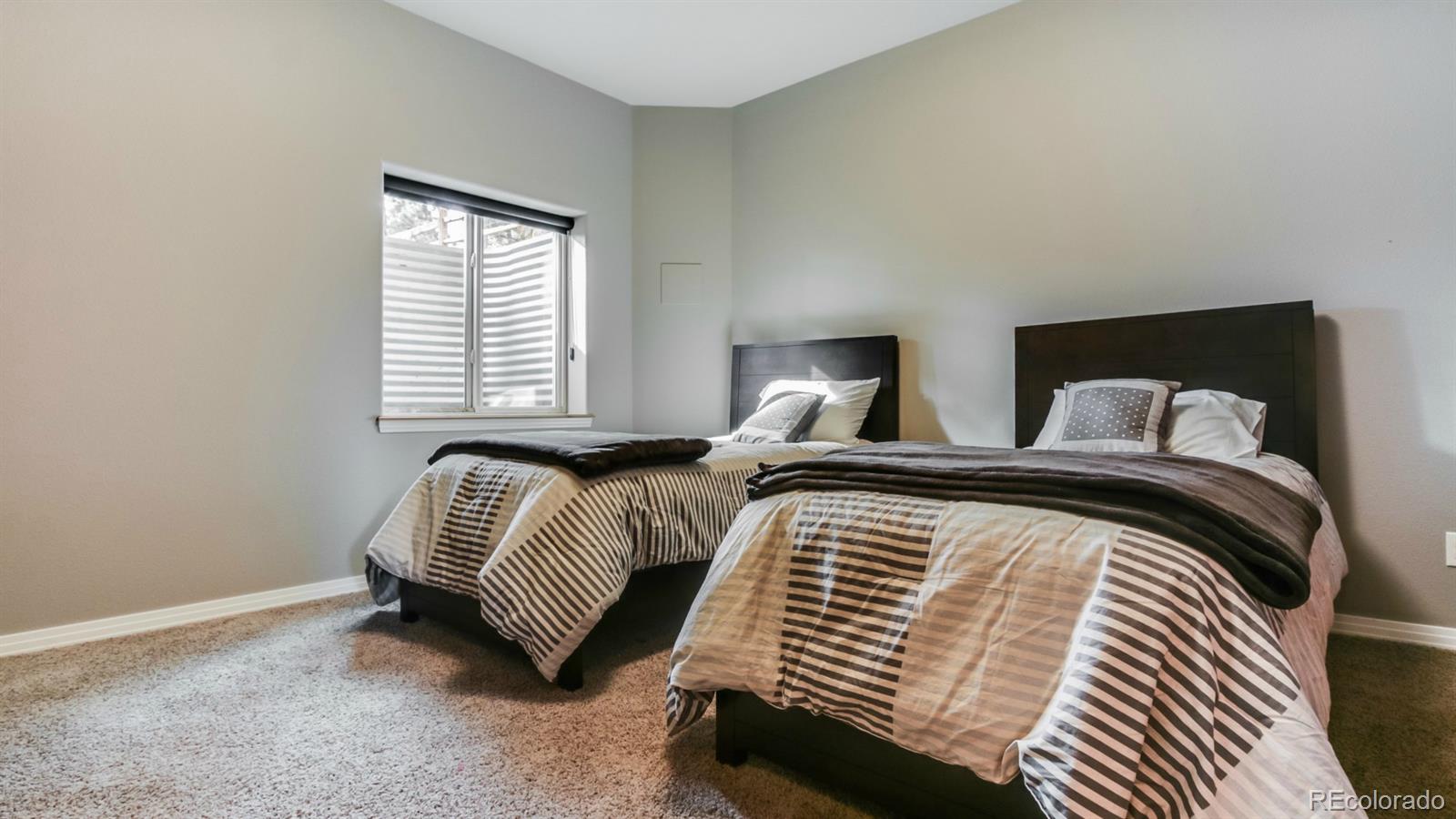 50 South Pine Road Golden, CO 80401 - Photo 31 of 35 a bedroom with a bed and a window