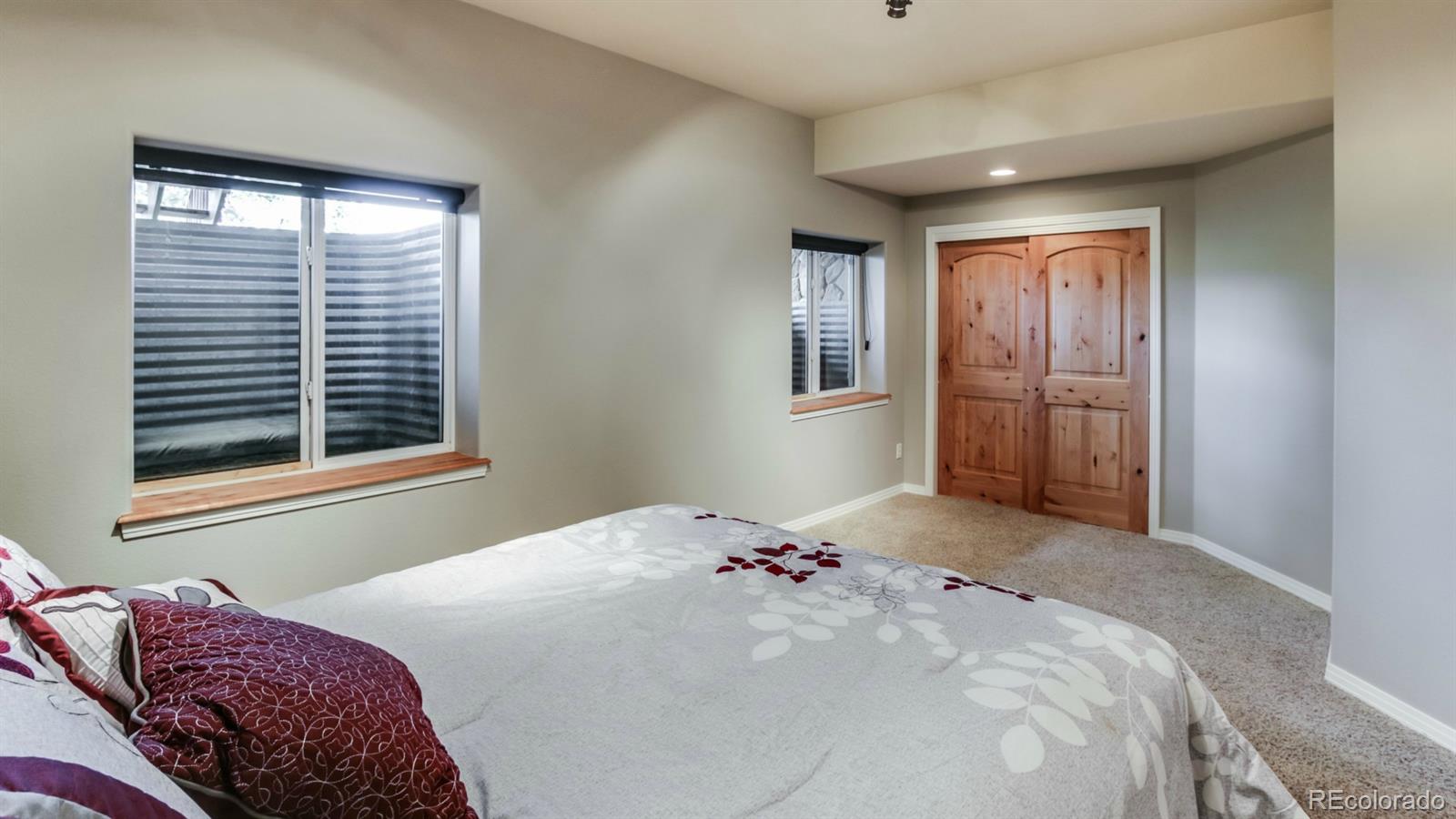 50 South Pine Road Golden, CO 80401 - Photo 32 of 35 a bedroom with a bed and a window