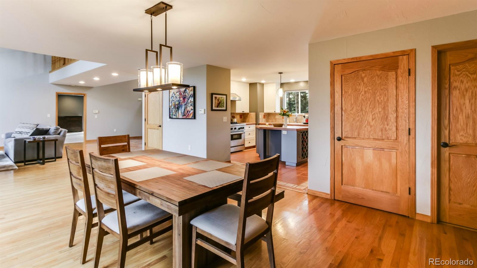50 South Pine Road Golden, CO 80401 - Photo 4 of 35 a view of a dining room with furniture window and wooden floor