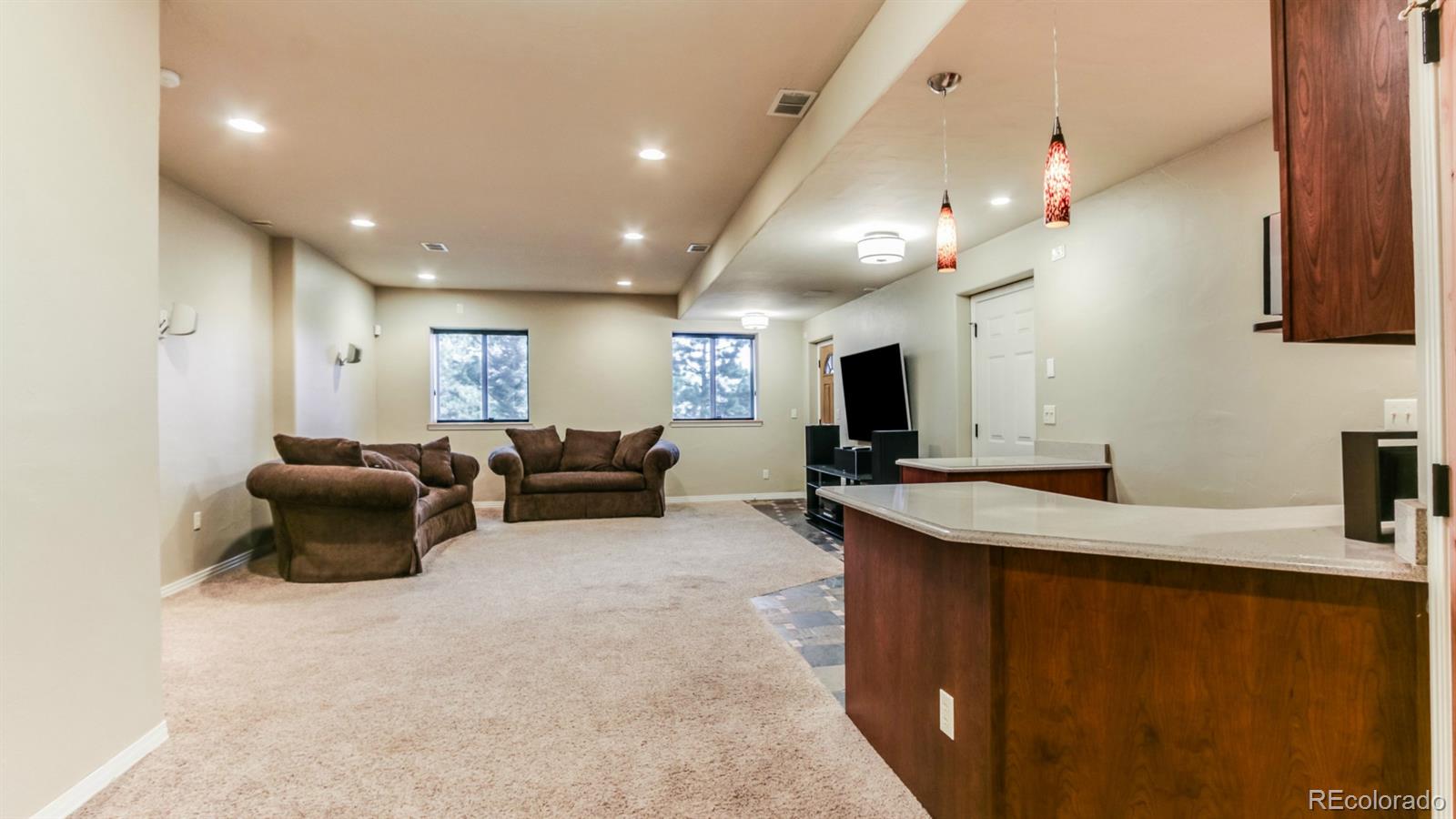 50 South Pine Road Golden, CO 80401 - Photo 9 of 35 a large room with lots of furniture and a large window