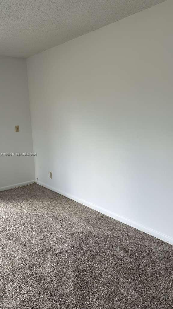 13731 Flora Place, Unit A Delray Beach, FL 33484 - Photo 5 of 21 a view of empty room