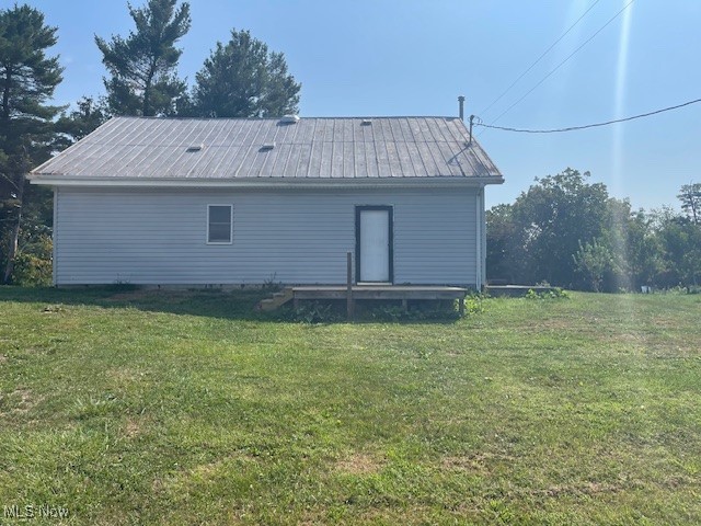 41275 Roy Watson Road Woodsfield, OH 43793 - Photo 22 of 26 Rear view of property with a yard