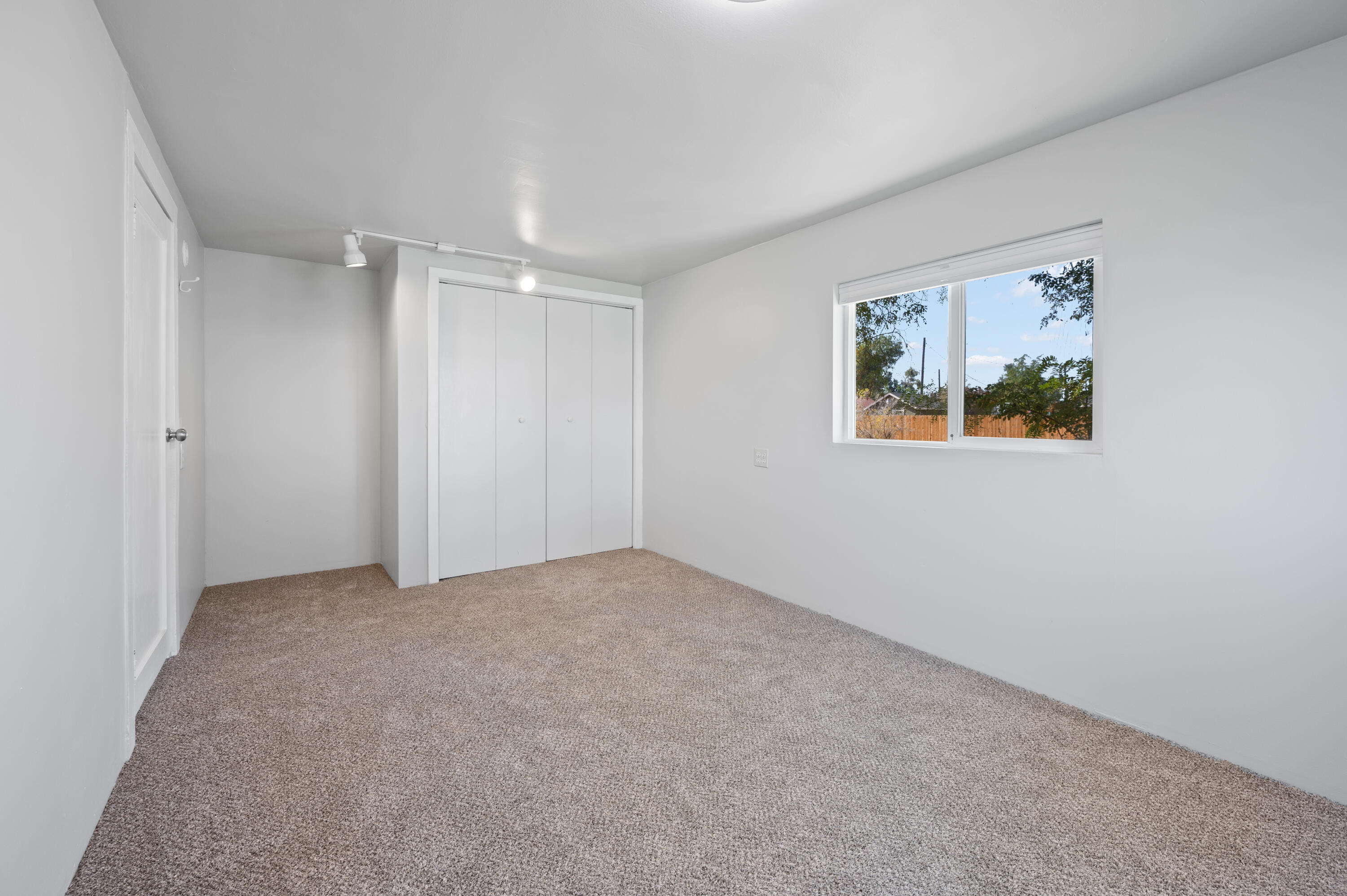 1940 Northeast Laughlin Road Prineville, OR 97754 - Photo 16 of 34 an empty room with windows and closet