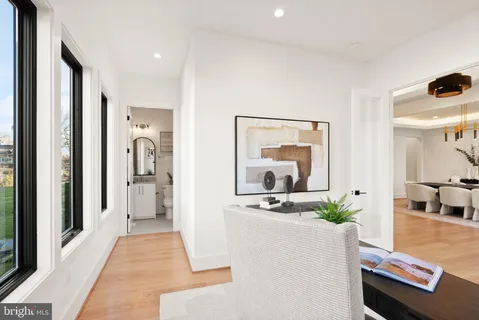 a view of room with wooden floor and window