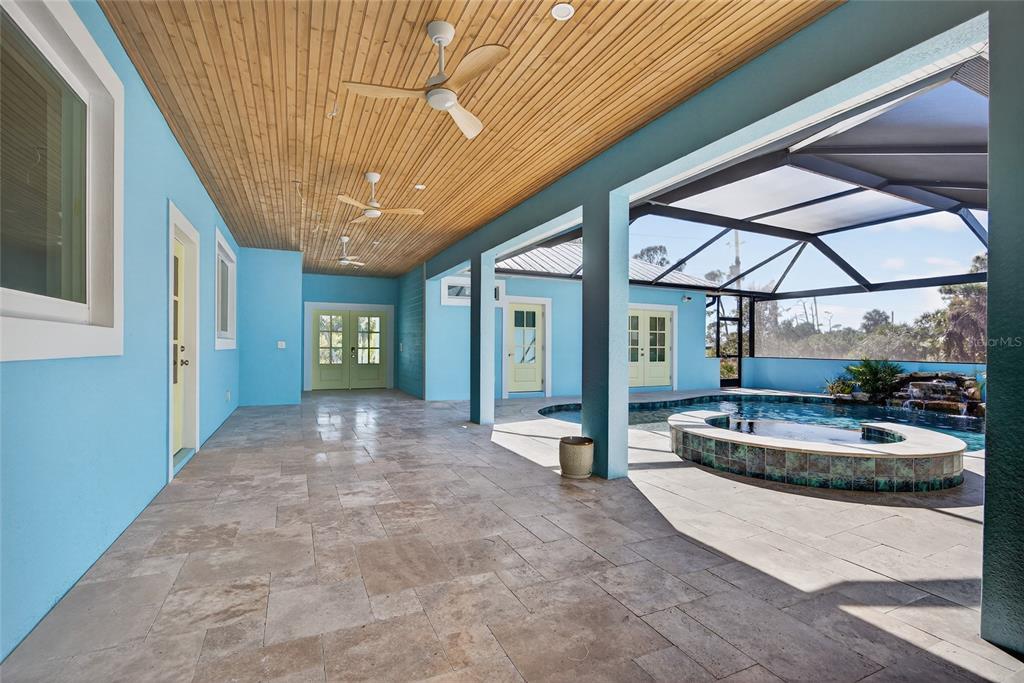 14192 Riseley Avenue Port Charlotte, FL 33953 - Photo 35 of 54 a view of a livingroom with porch and outdoor space