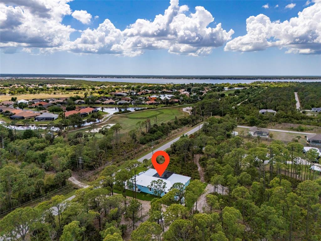 14192 Riseley Avenue Port Charlotte, FL 33953 - Photo 4 of 54 a view of swimming pool and an outdoor space