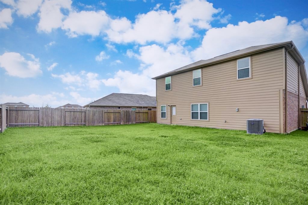 1303 Emerald Stone Drive Rosharon, TX 77583 - Photo 21 of 25 Oversized backyard retreat perfect for creating a custom pool and outdoor living paradise.