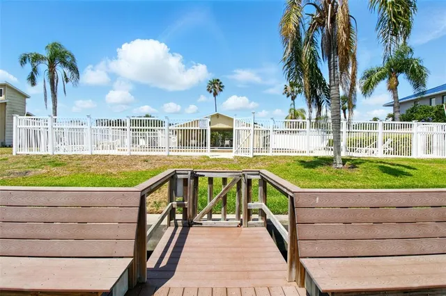 a view of a chairs and table on the terrace