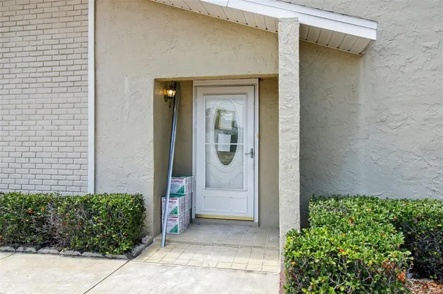 a front view of a house with a garage