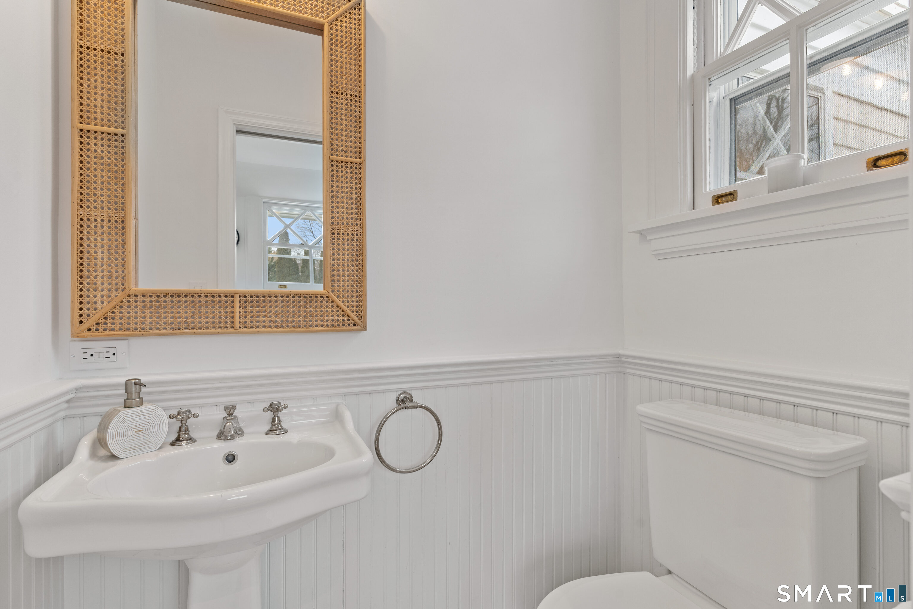 40 Rogers Road Stamford, CT 06902 - Photo 19 of 40 a bathroom with a sink and a mirror