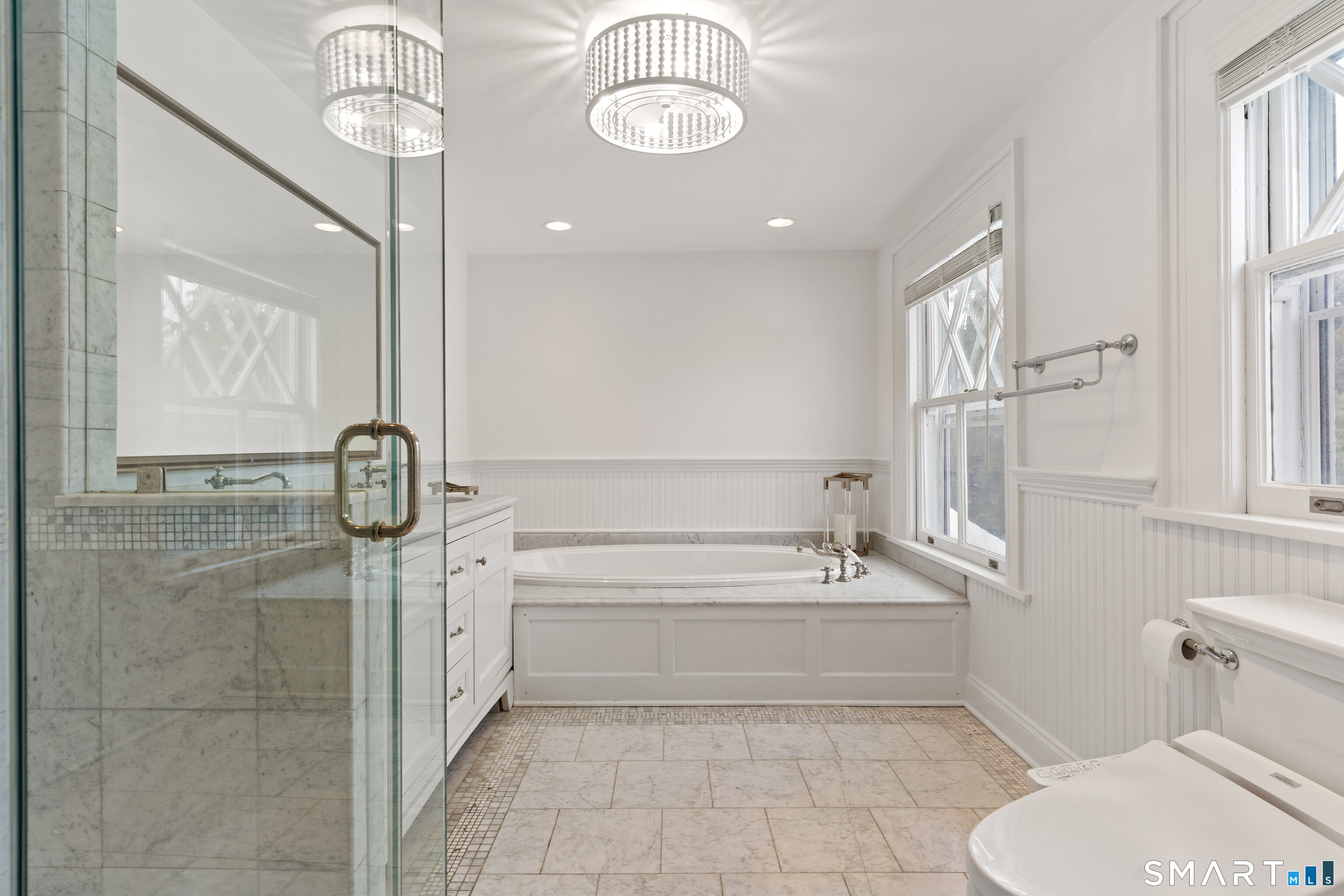 40 Rogers Road Stamford, CT 06902 - Photo 25 of 40 a bathroom with a sink a toilet and a bathtub