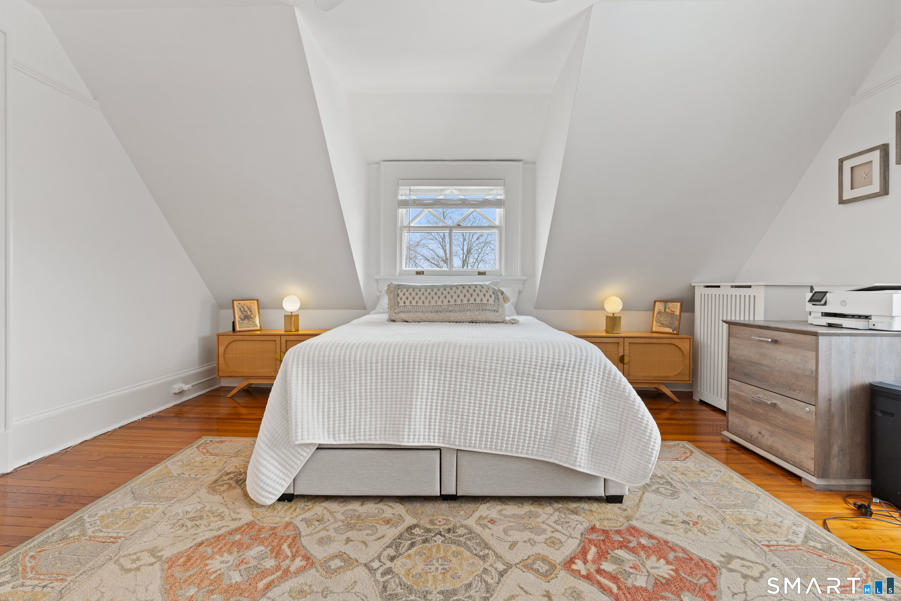 40 Rogers Road Stamford, CT 06902 - Photo 28 of 40 a bedroom with a bed and a couch