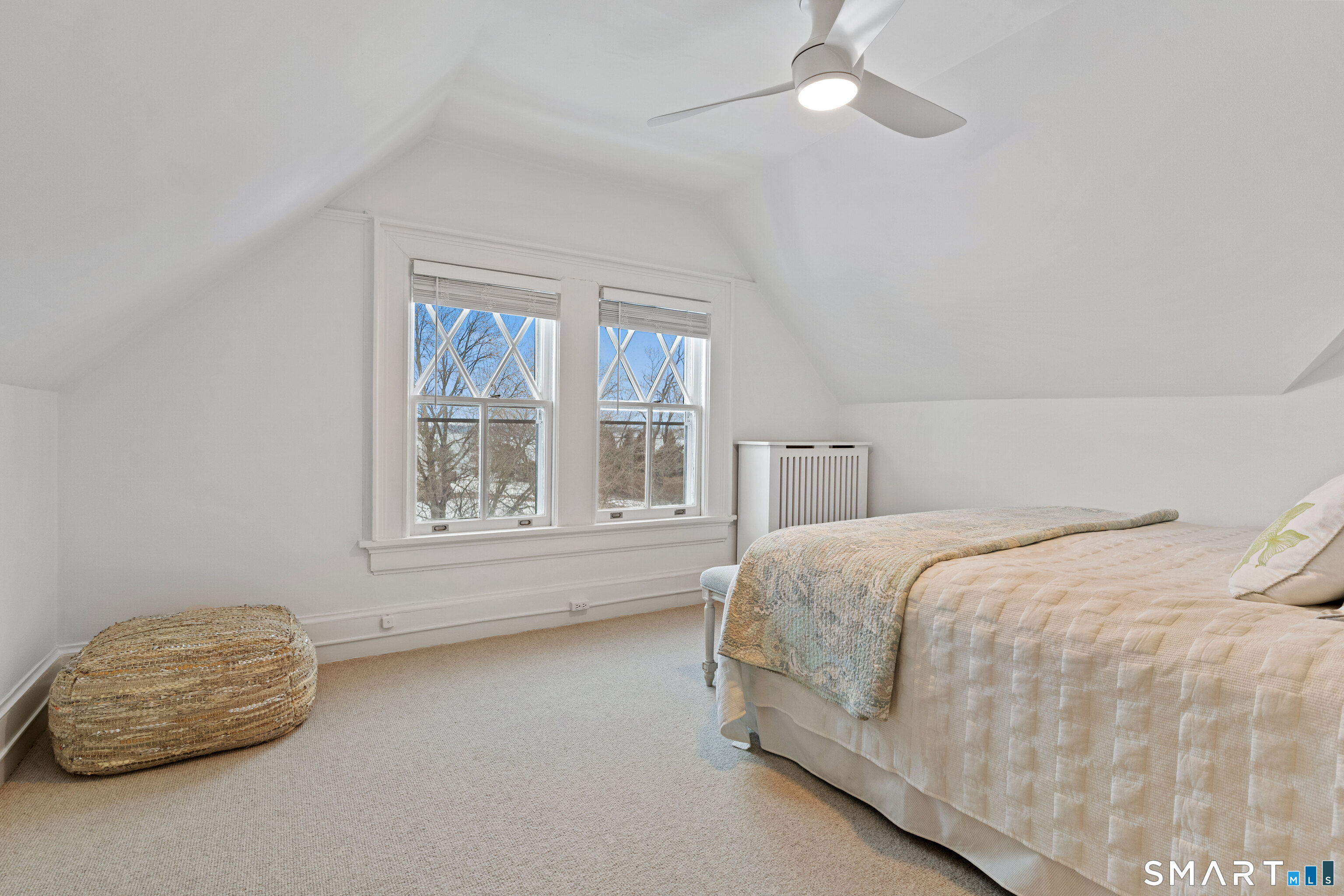 40 Rogers Road Stamford, CT 06902 - Photo 32 of 40 a bedroom with a bed and a window