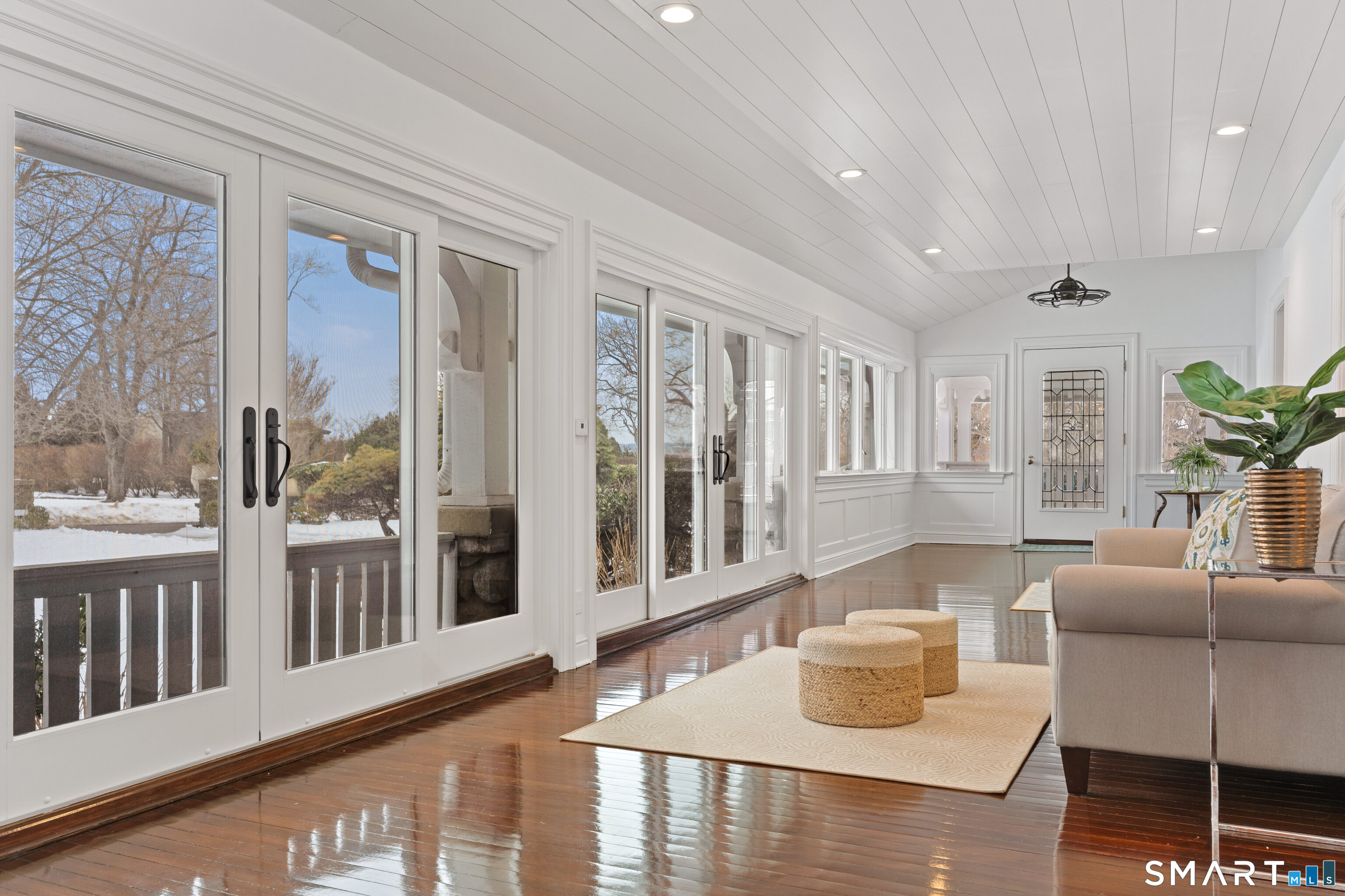 40 Rogers Road Stamford, CT 06902 - Photo 5 of 40 a living room with furniture and a large window