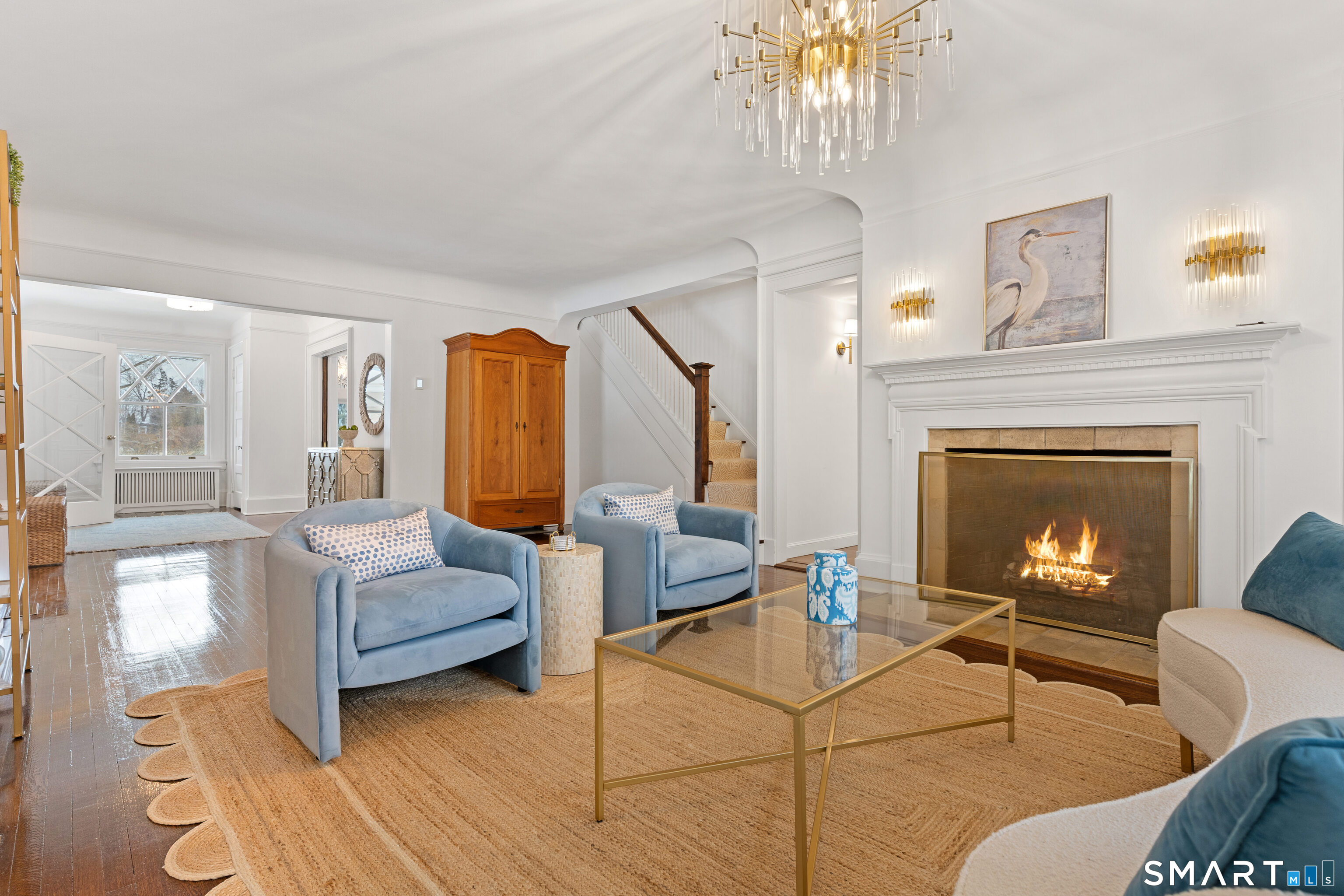 40 Rogers Road Stamford, CT 06902 - Photo 9 of 40 a living room with furniture and a fireplace