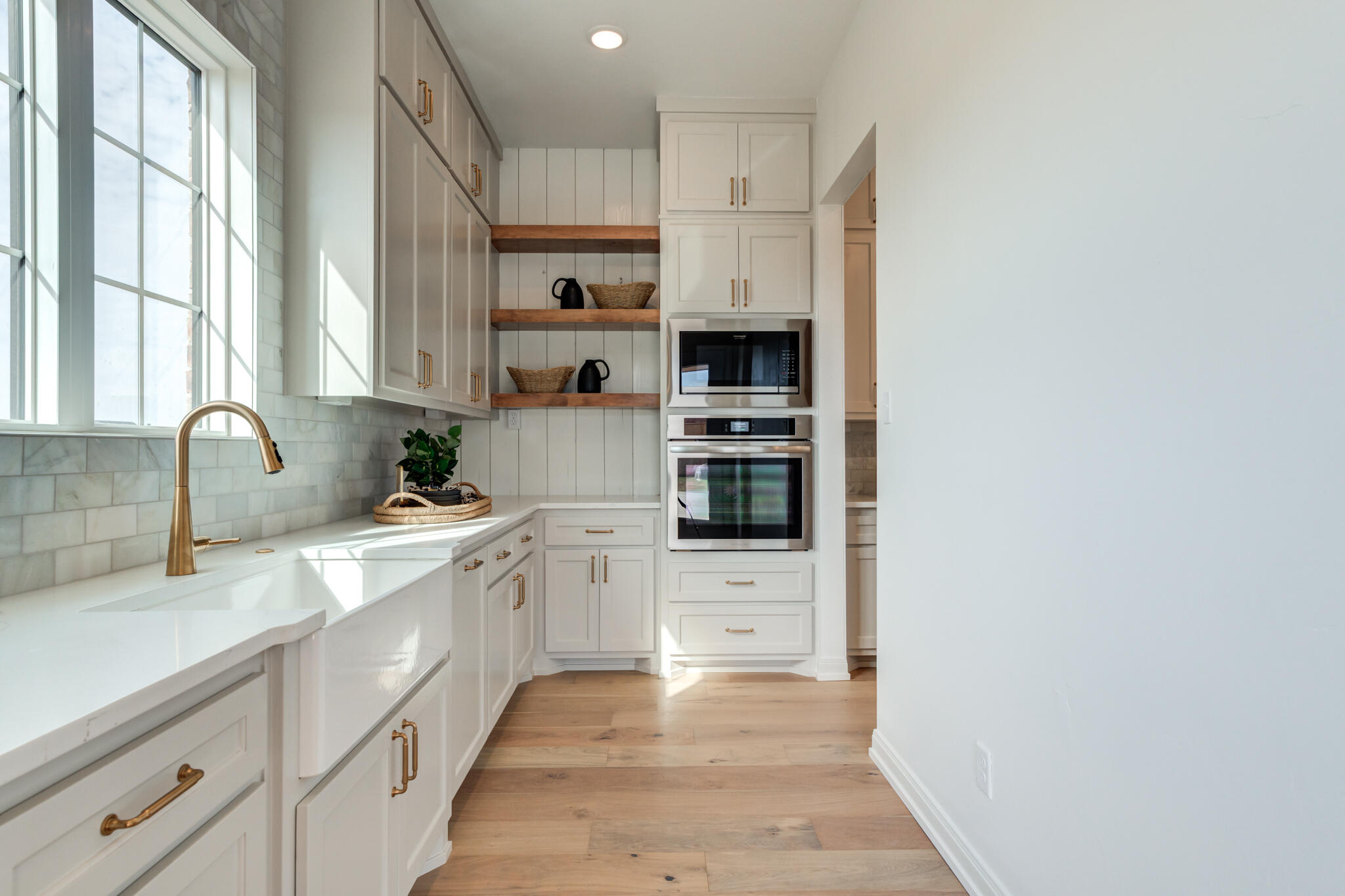 5309 County Road 7670 Lubbock, TX 79424 - Photo 18 of 57 a kitchen with stainless steel appliances granite countertop a stove and a sink