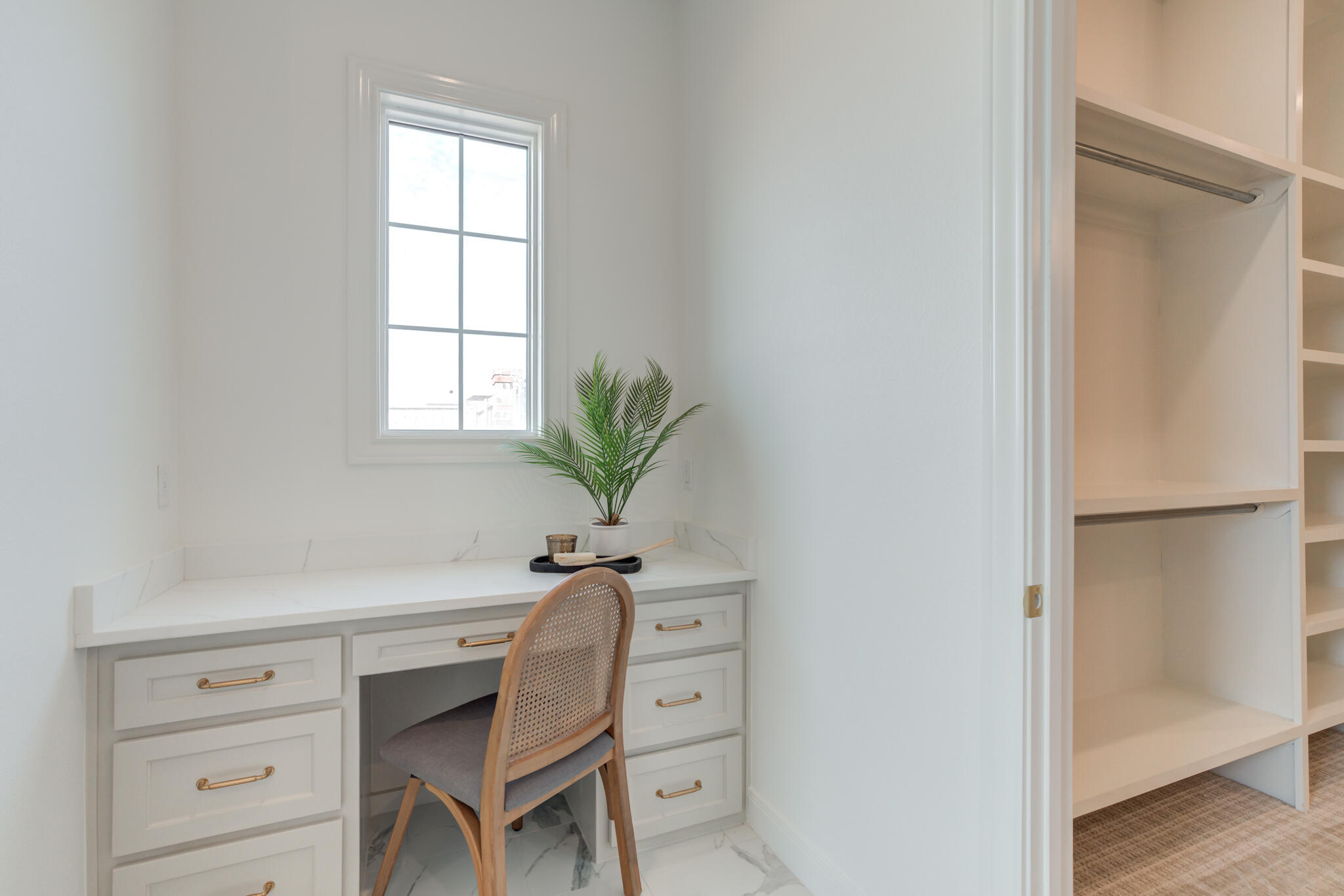 5309 County Road 7670 Lubbock, TX 79424 - Photo 21 of 57 a view of cabinets with wooden floor and windows