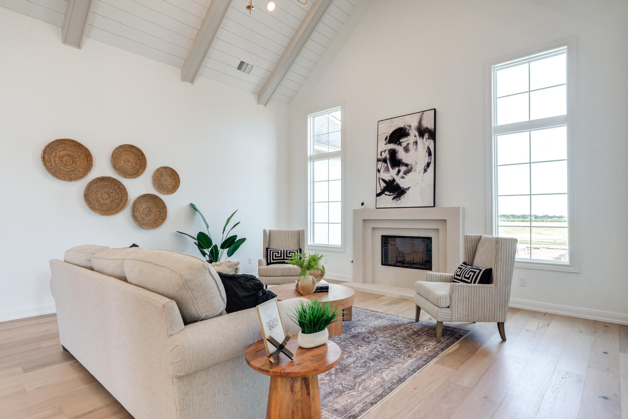 5309 County Road 7670 Lubbock, TX 79424 - Photo 31 of 57 a living room with furniture and a fireplace