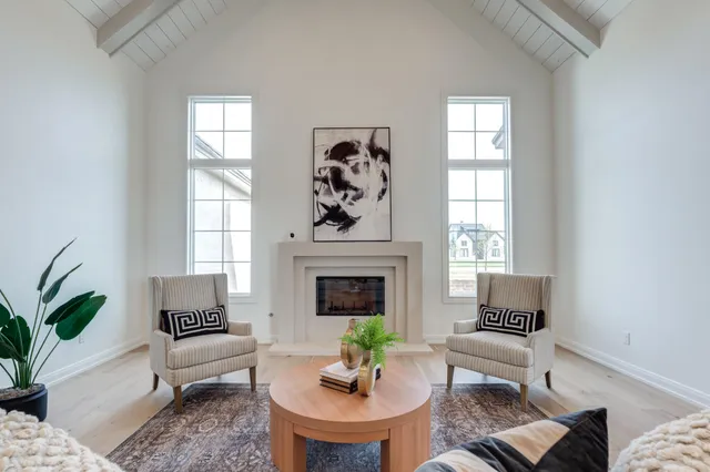 a kitchen with stainless steel appliances granite countertop white cabinets a sink and dishwasher