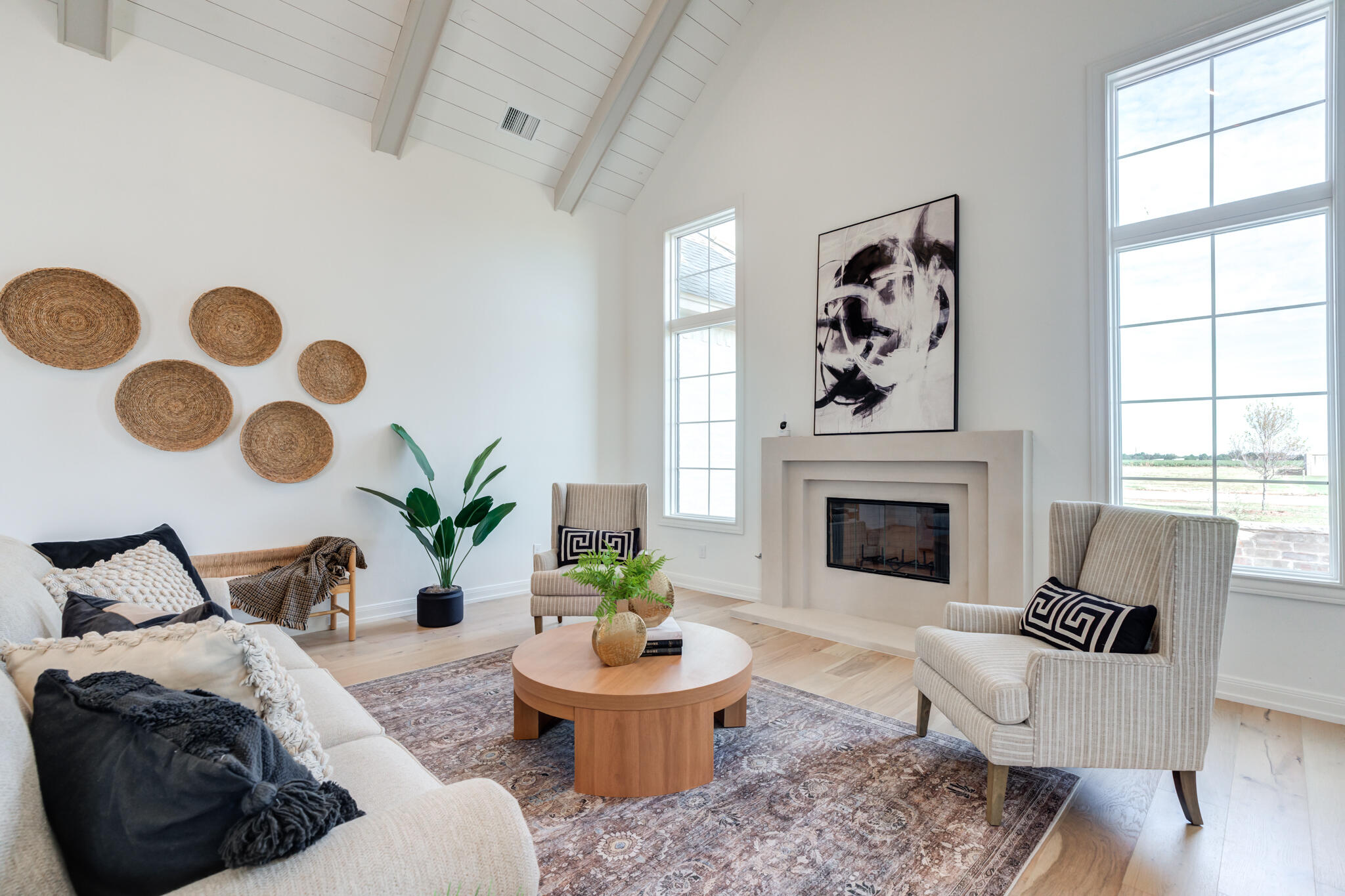 5309 County Road 7670 Lubbock, TX 79424 - Photo 7 of 57 a living room with furniture and a fireplace