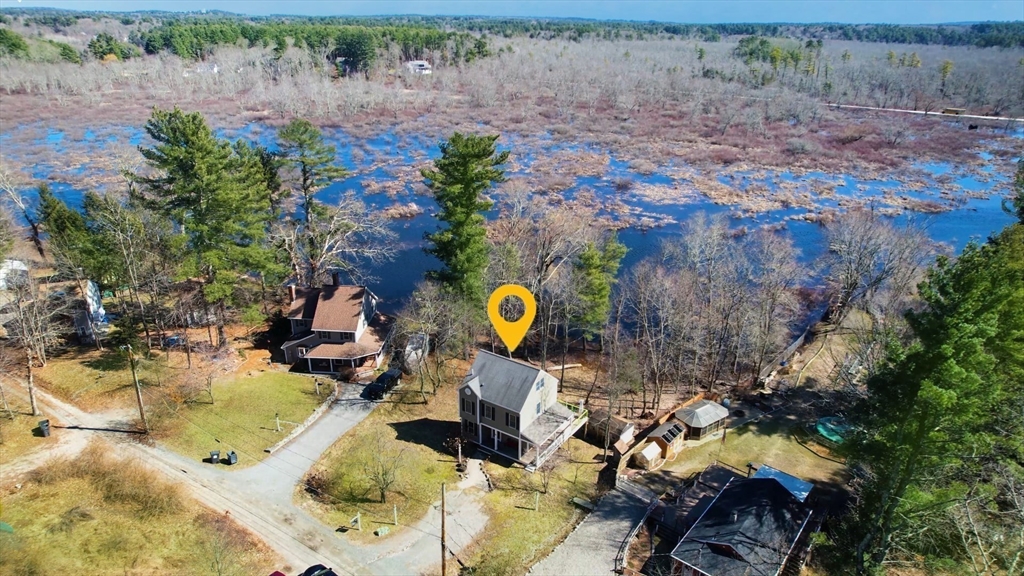 68 Meadow Cart Way Millis, MA 02054 - Photo 24 of 28 a aerial view of a house with a yard and lake view
