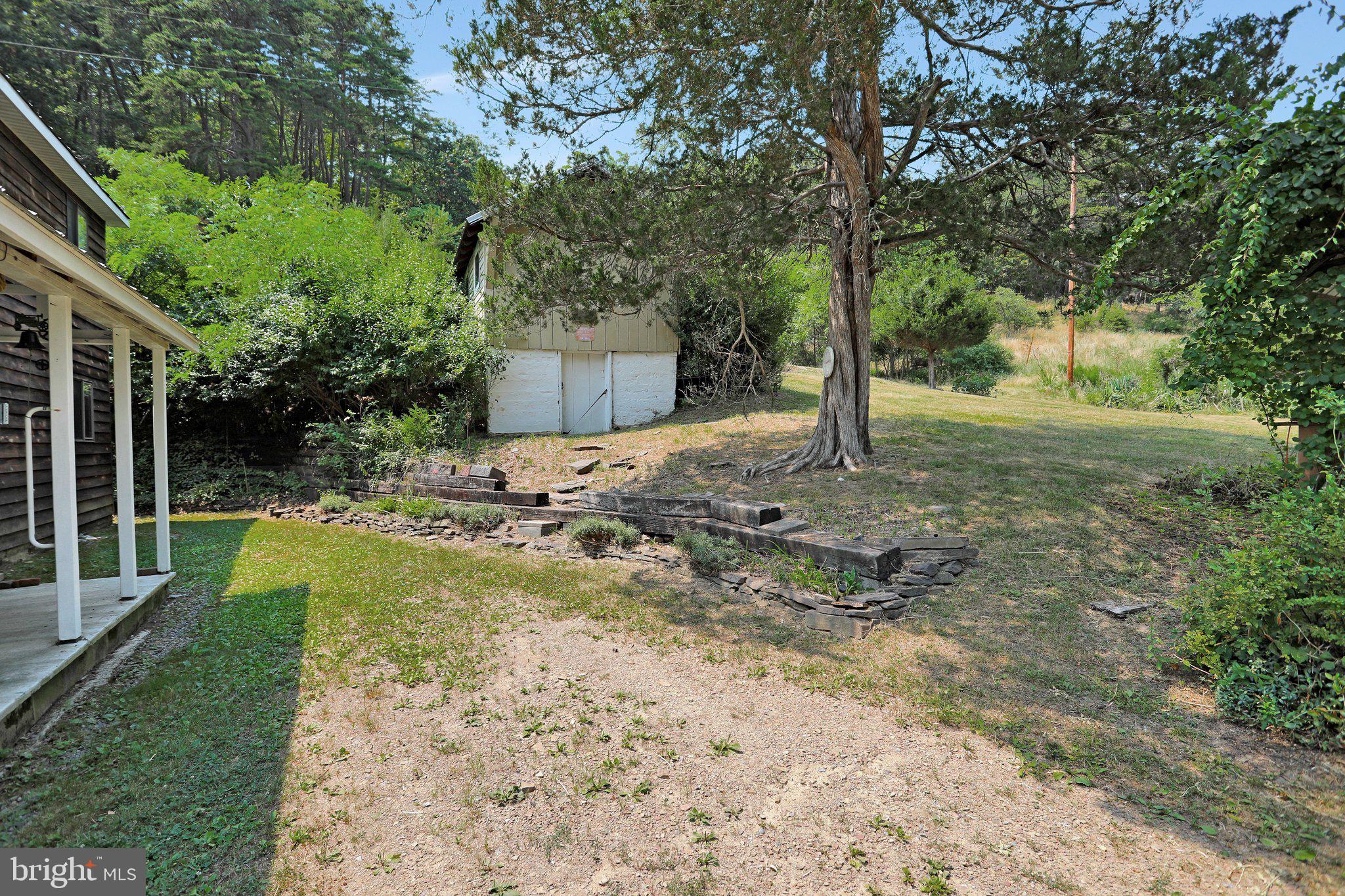 1189 Hartman Road Berkeley Springs, WV 25411 - Photo 35 of 56 Shed with root cellar