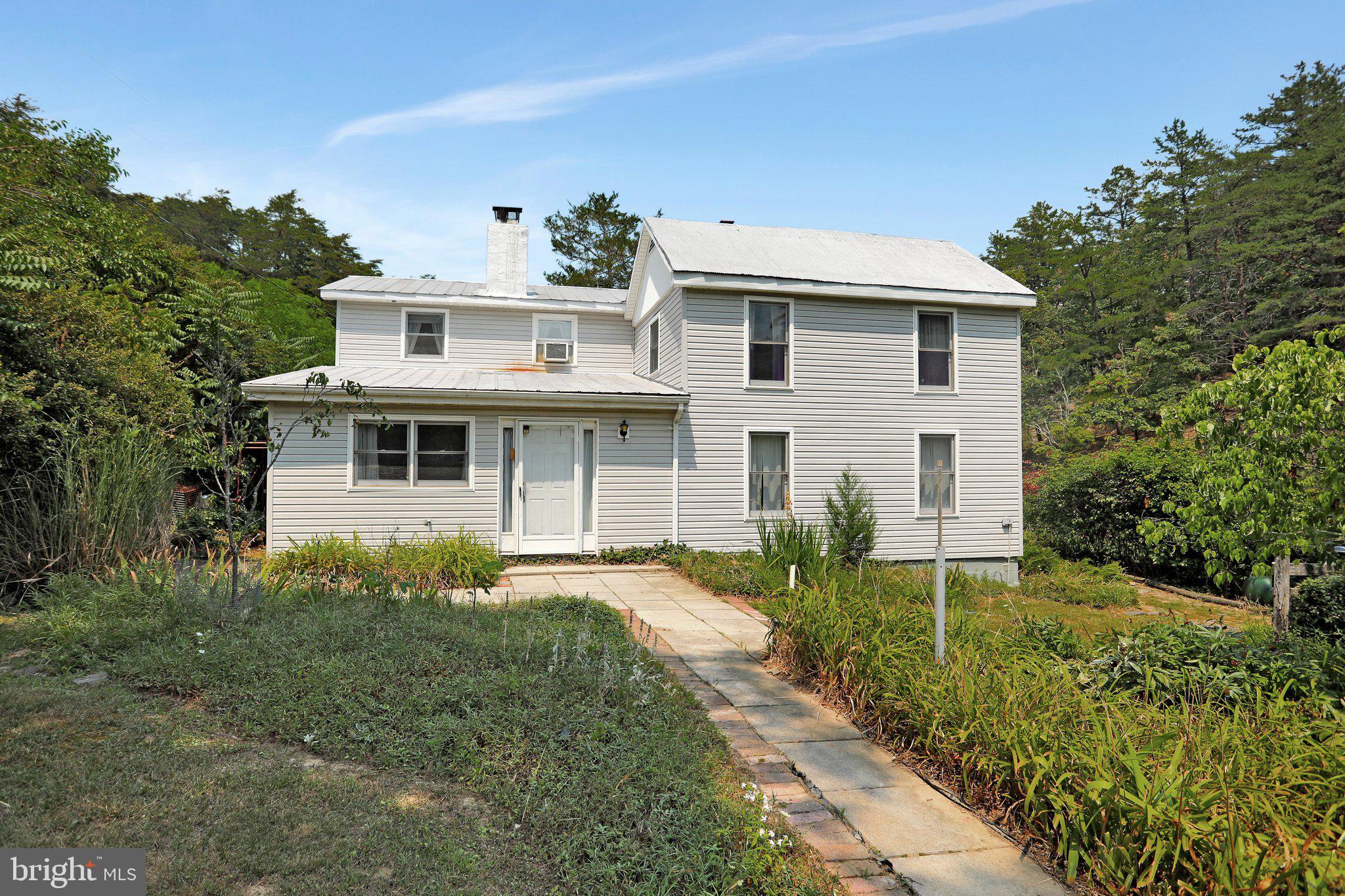 1189 Hartman Road Berkeley Springs, WV 25411 - Photo 5 of 56 Front
