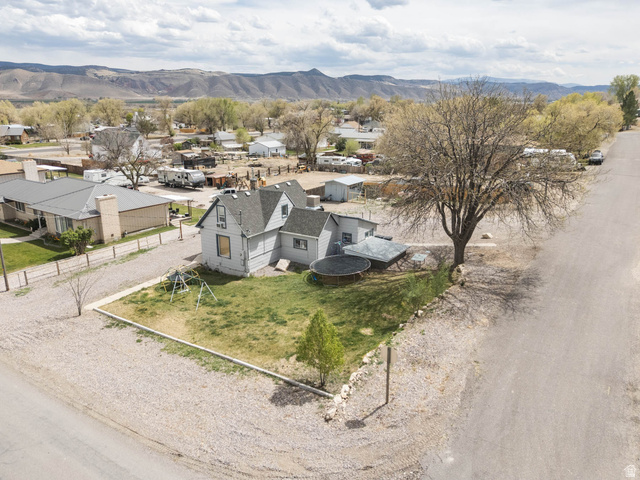 197 West 100 South Redmond, UT 84652 - Photo 32 of 41 Aerial view of residential area with a mountain backdrop