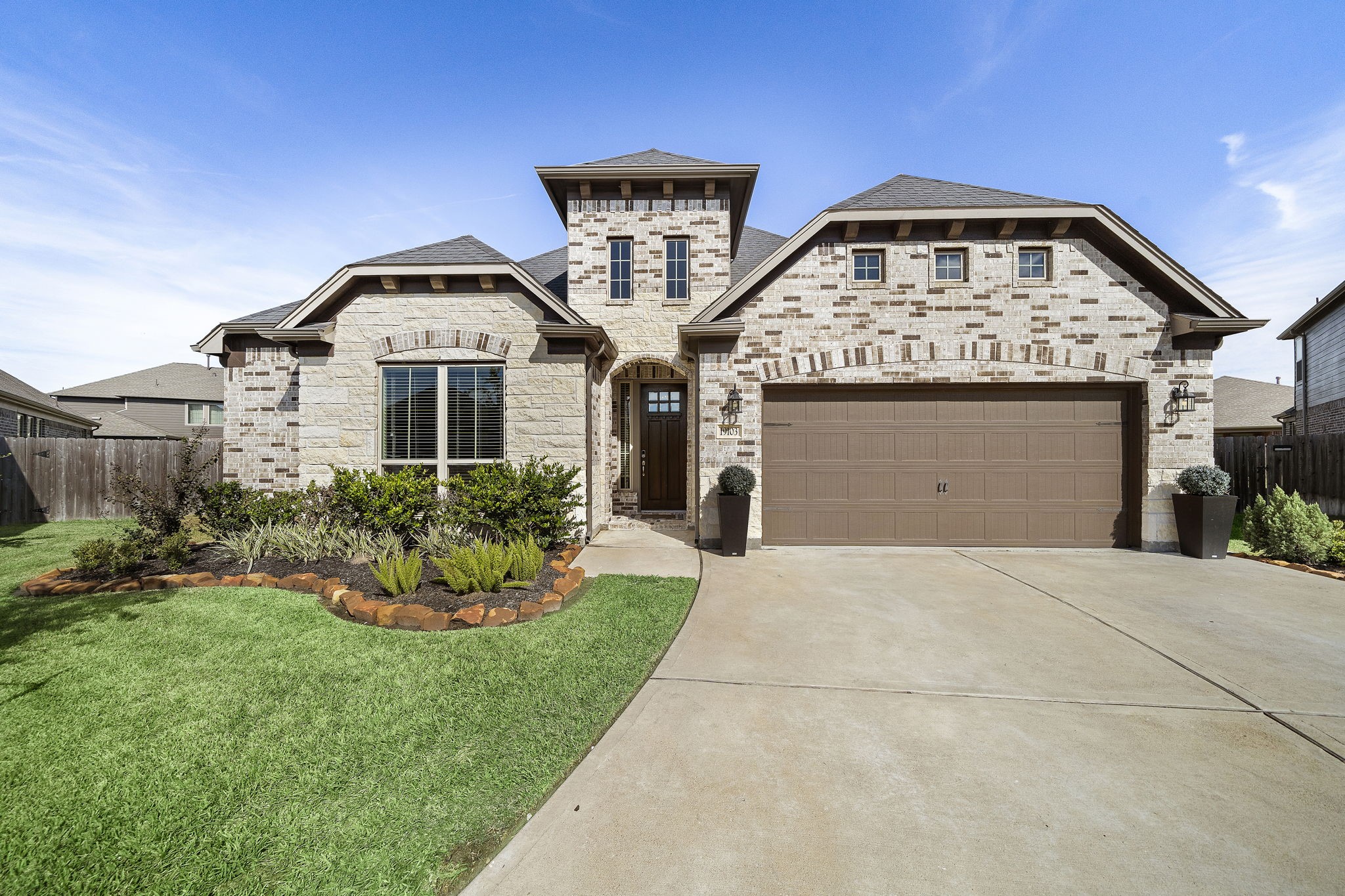 19103 Heather Downs Court Cypress, TX 77429 - Photo 1 of 35 a front view of a house with a yard