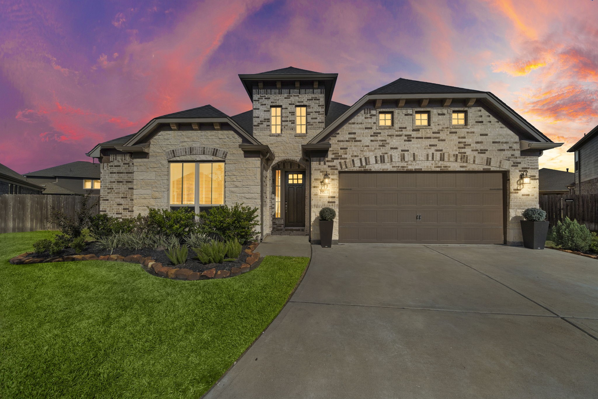 19103 Heather Downs Court Cypress, TX 77429 - Photo 2 of 35 a front view of a house with garden