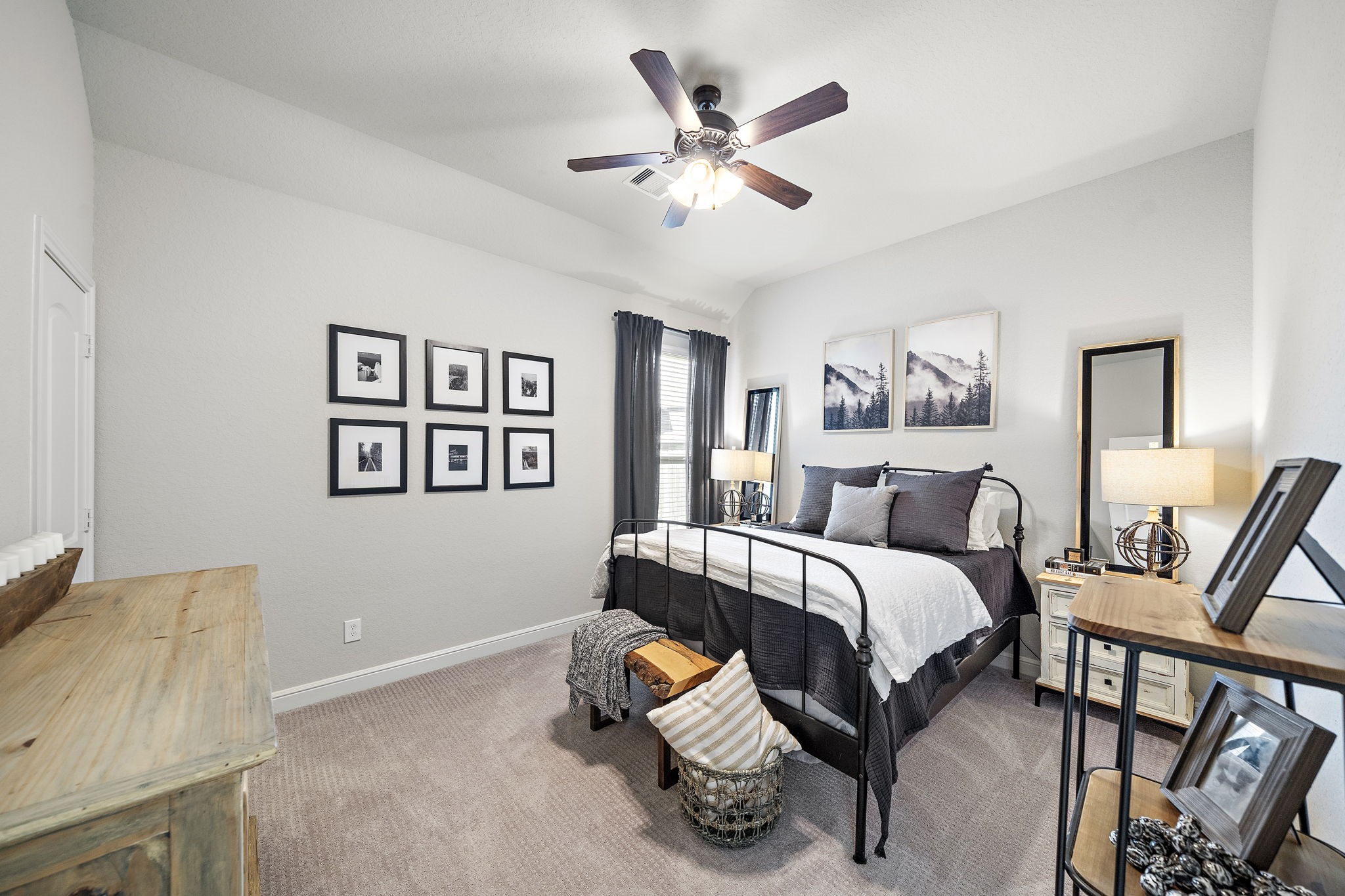 19103 Heather Downs Court Cypress, TX 77429 - Photo 24 of 35 a bedroom with a bed and wooden floor