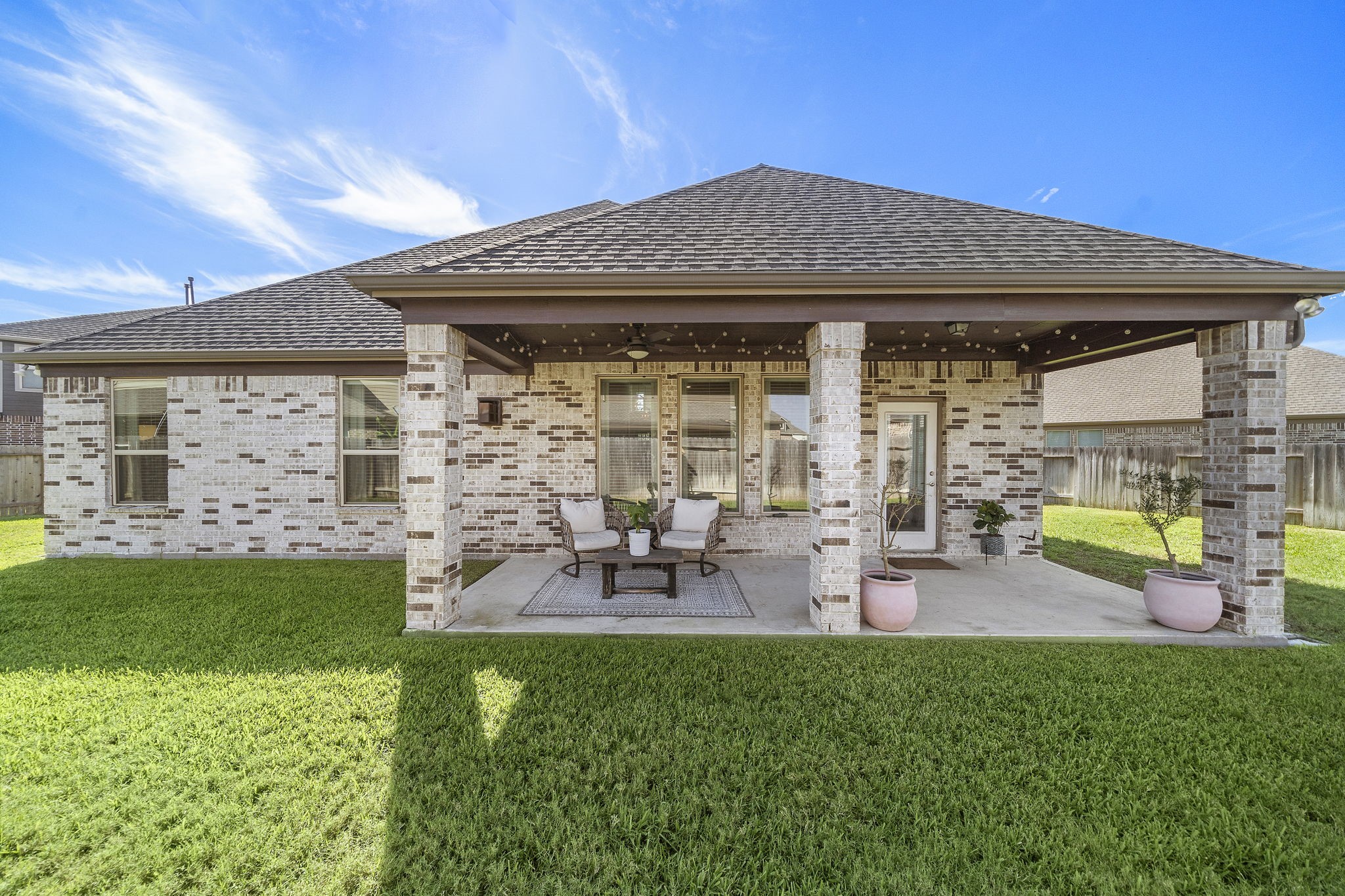 19103 Heather Downs Court Cypress, TX 77429 - Photo 34 of 35 a view of a house with backyard porch and sitting area