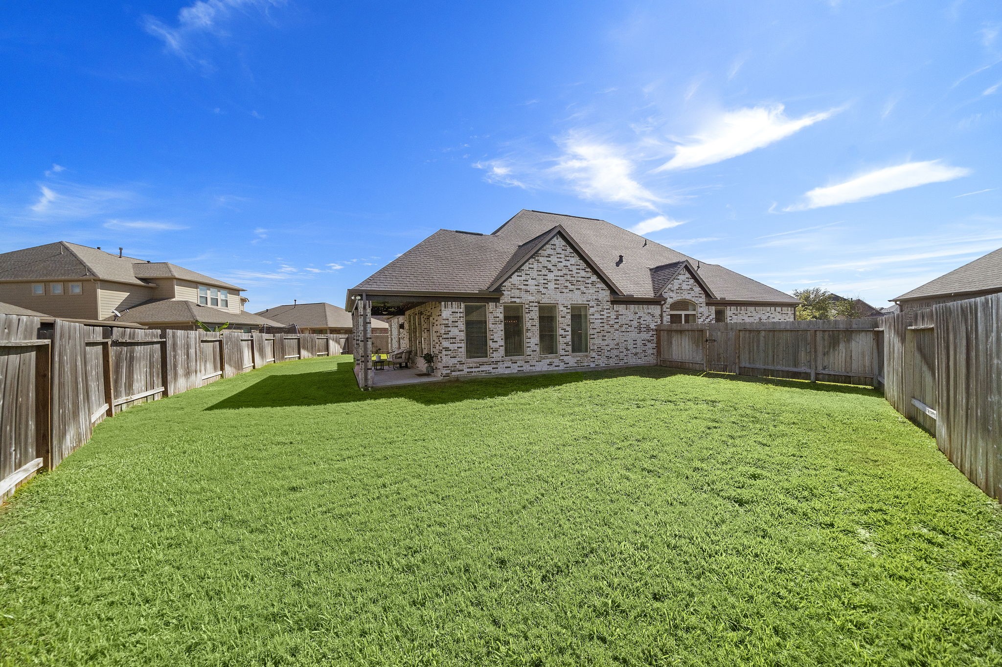 19103 Heather Downs Court Cypress, TX 77429 - Photo 35 of 35 a view of a house with backyard and porch