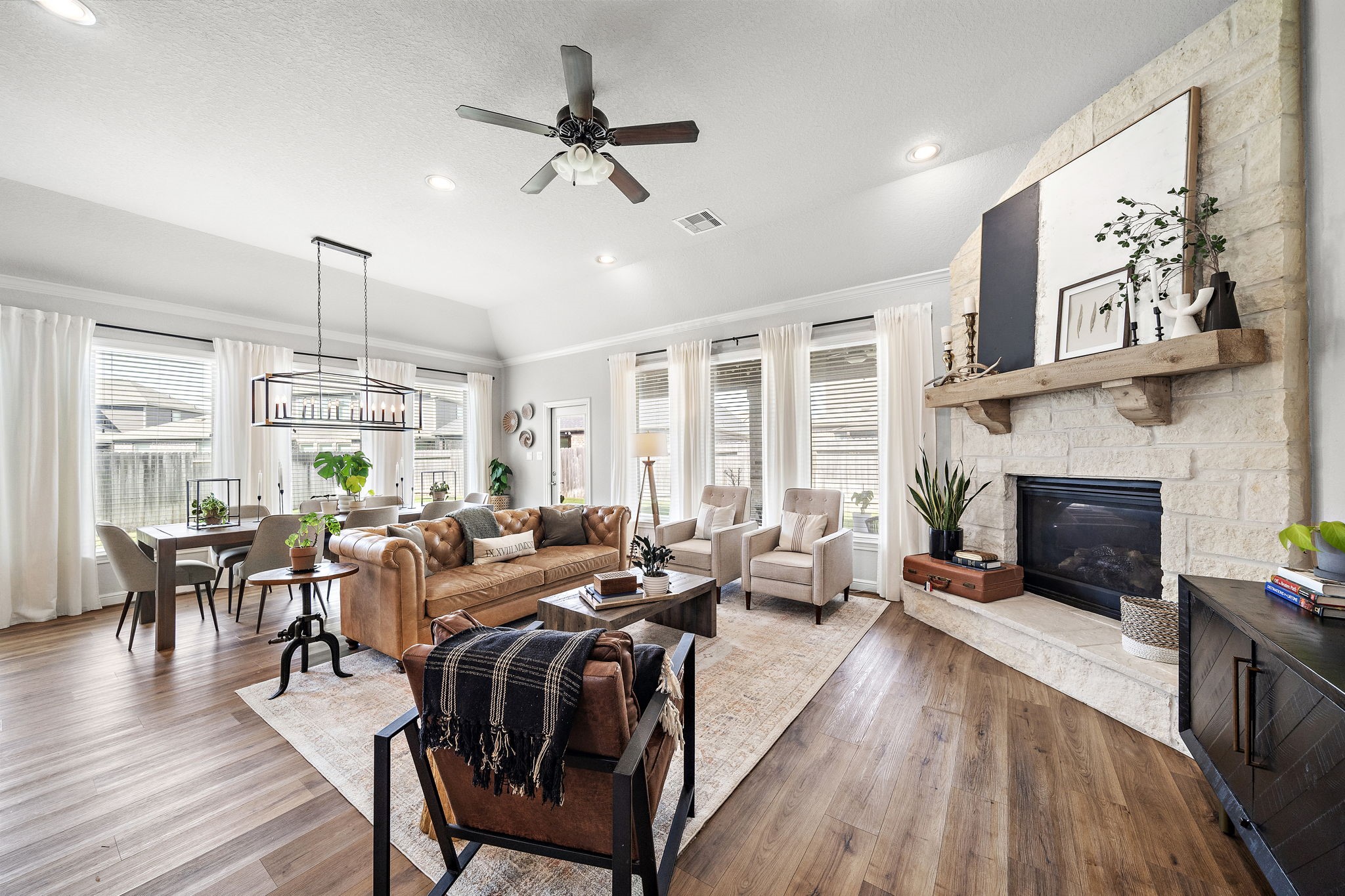 19103 Heather Downs Court Cypress, TX 77429 - Photo 7 of 35 a living room with furniture fireplace and window