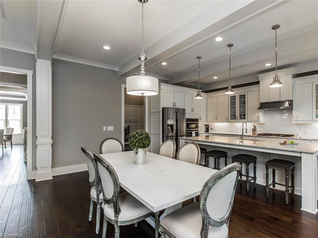 6807 Koala Drive Oak Ridge, NC 27310 - Photo 14 of 28 Every decorative, lighting, and molding option has been implemented to create a truly show stopping kitchen.